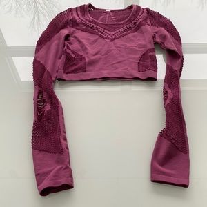 Alo yoga long sleeve top in laddered slash effect design in deep pink
